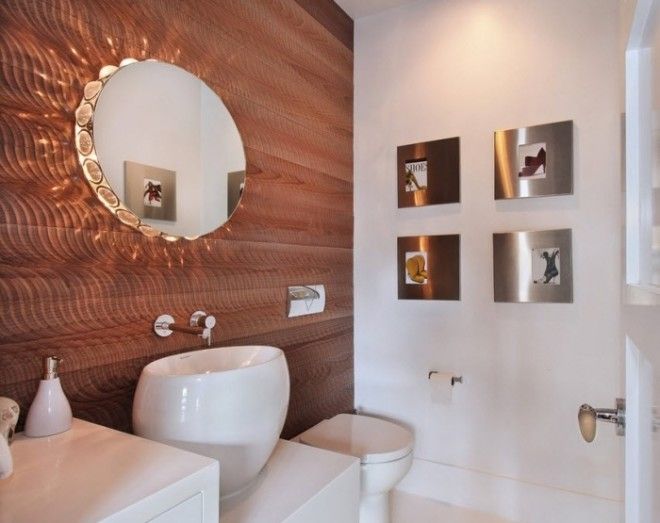 Овальная форма раковины в ванной комнате с максимально функциональным и минимальным декором