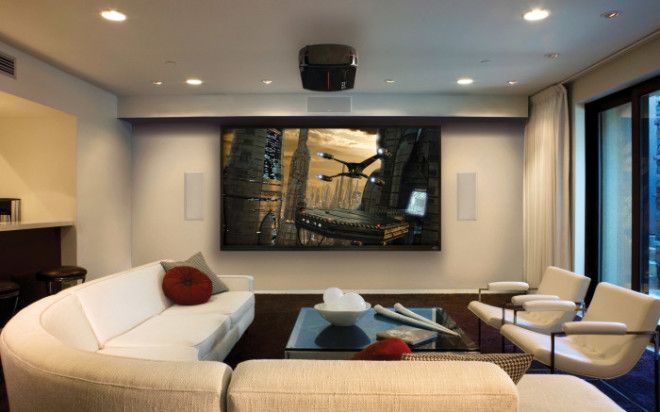 Плазменная панель которая является акцентным элементом не только в зоне для просмотра телевизора но и во всей гостиной 